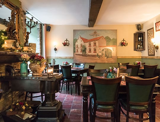 Photo of the interior of Gasterij de Poort a restaurant in Gulpen