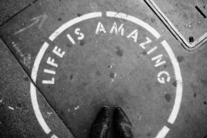Photo showing the text "Life is amazing"